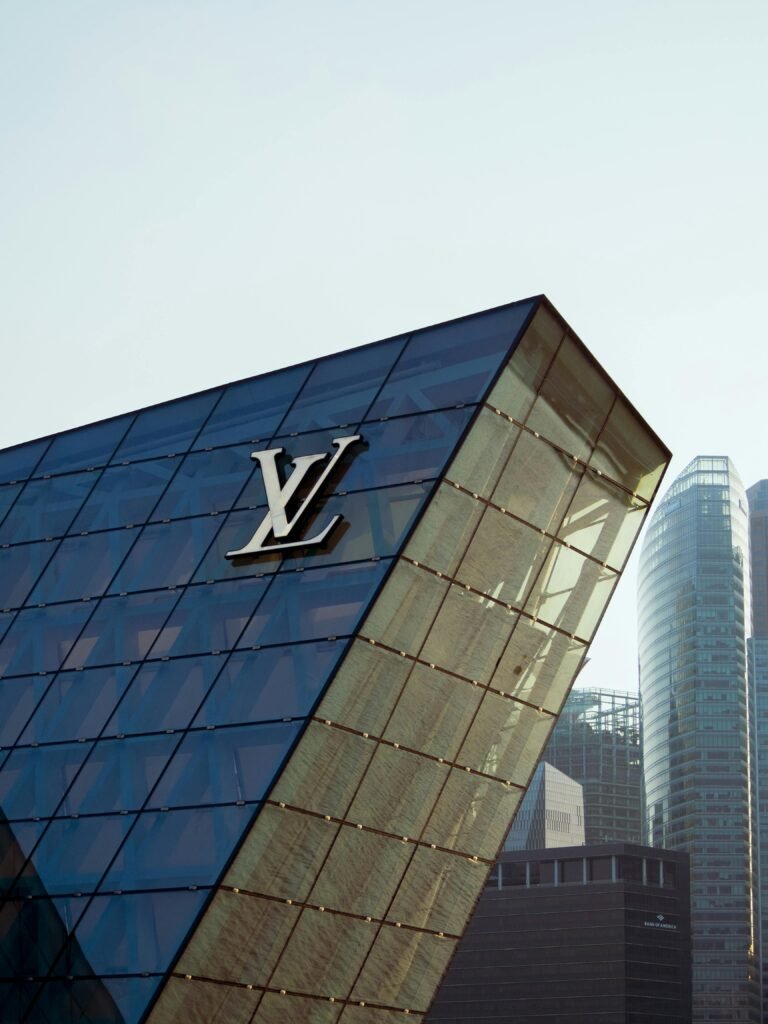 Futuristic Louis Vuitton store design in Singapore's Marina Bay, showcasing modern urban architecture.